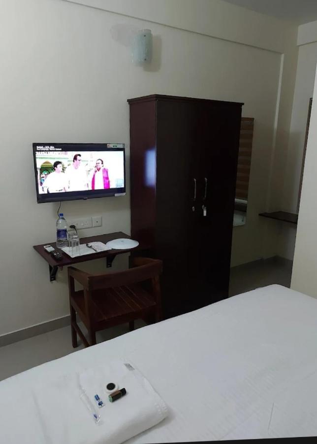 Masterkey Deluxe Rooms Kochi Bagian luar foto